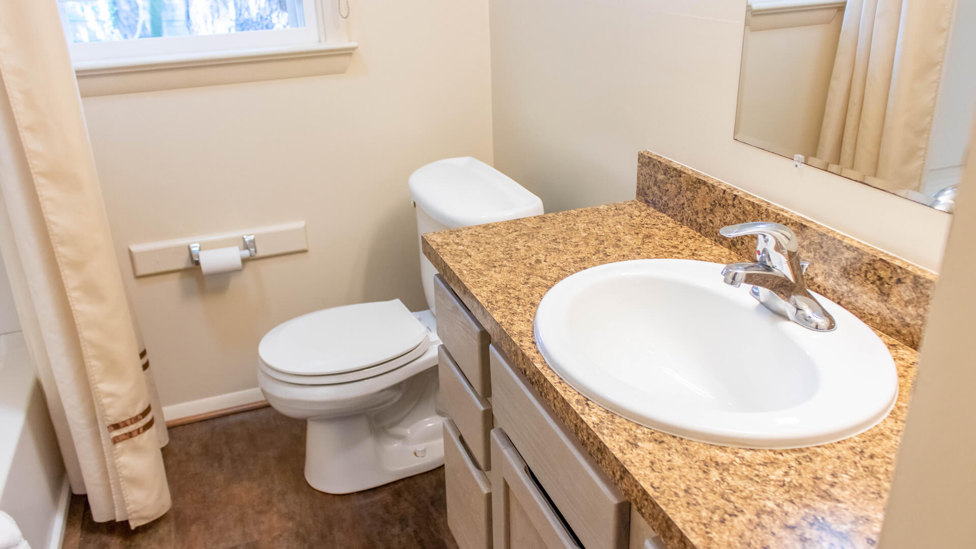 Vacation Homes 600-613 room with bathroom sink and toilet
