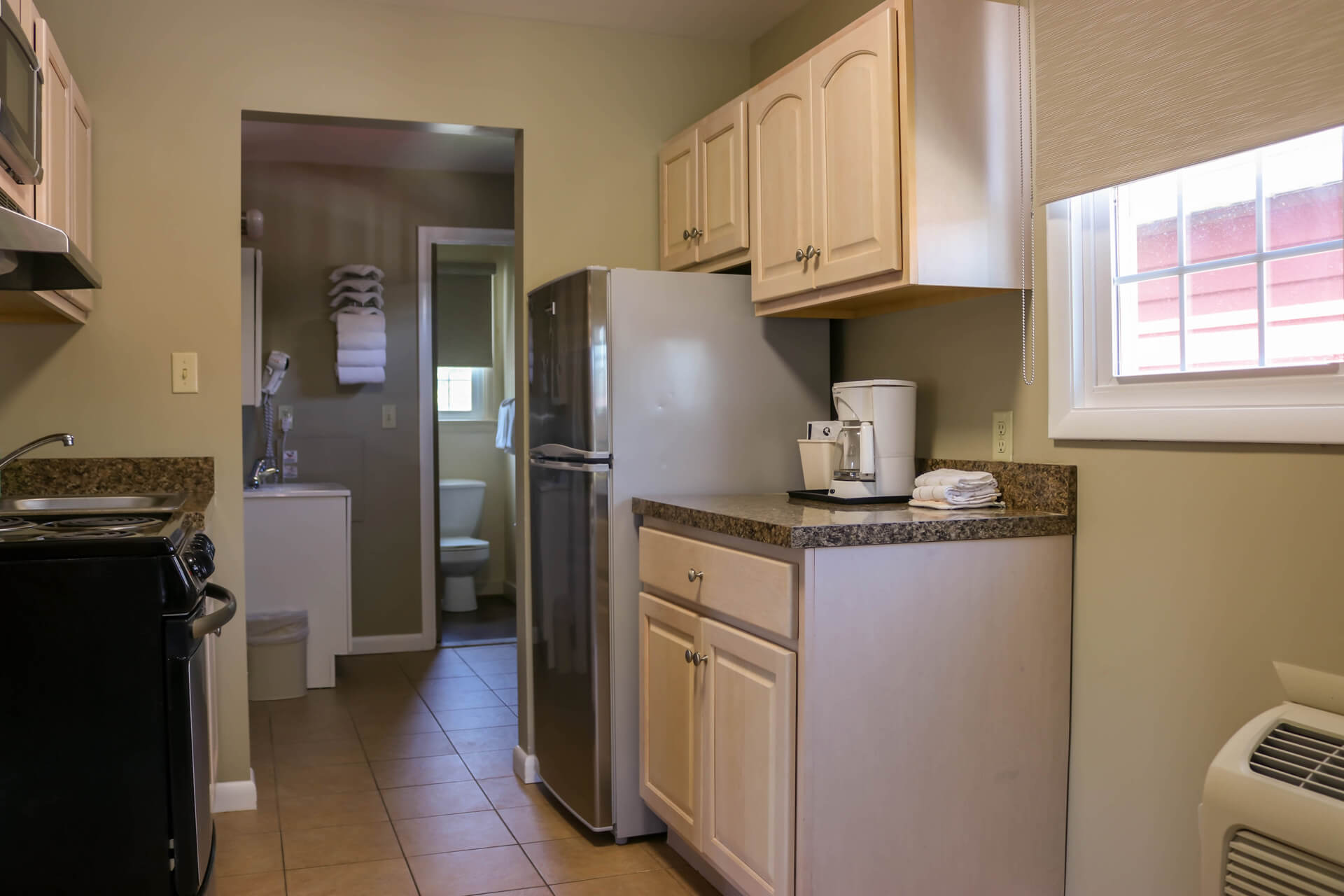 Vacation Homes 600-613 room with small kitchen